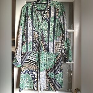 Anthropologie dress  fit loose dropped waist has pockets.